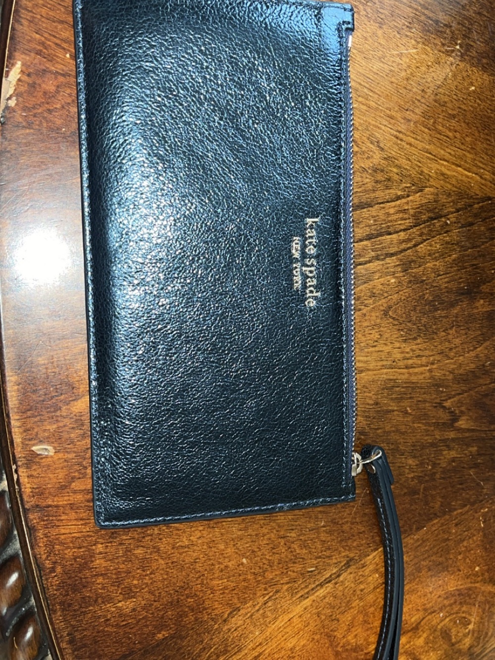 kate spade black leather wristlet with gold logo detail